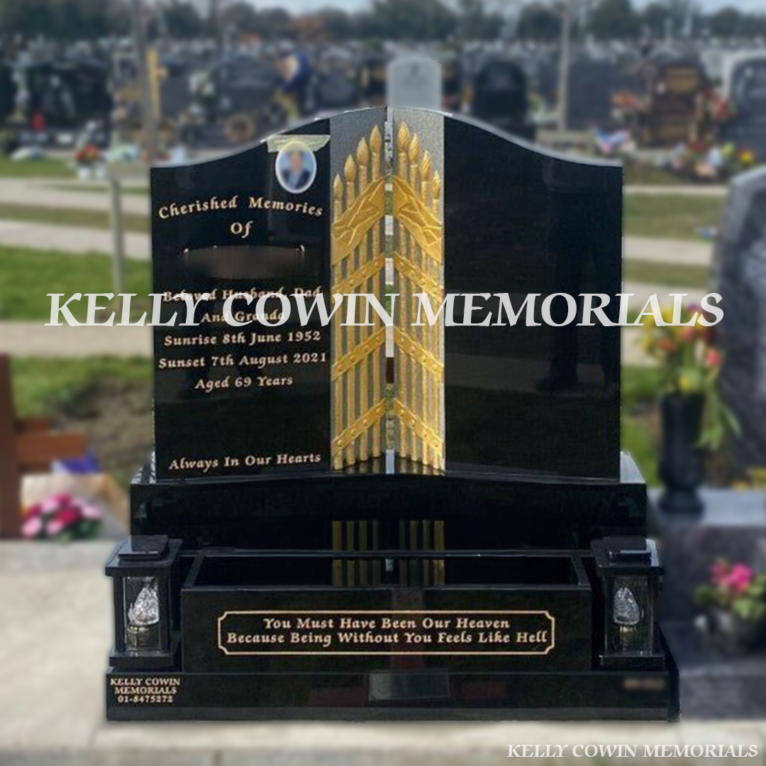 Front view of black granite antique carved Gates of Heaven headstone with gold inscription in Dardistown Cemetery Dublin