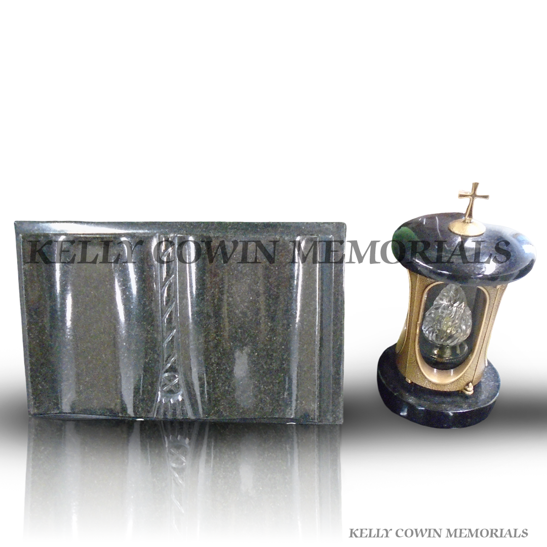 Polished black granite memorial book plaque with matching grave lantern and cross detail.