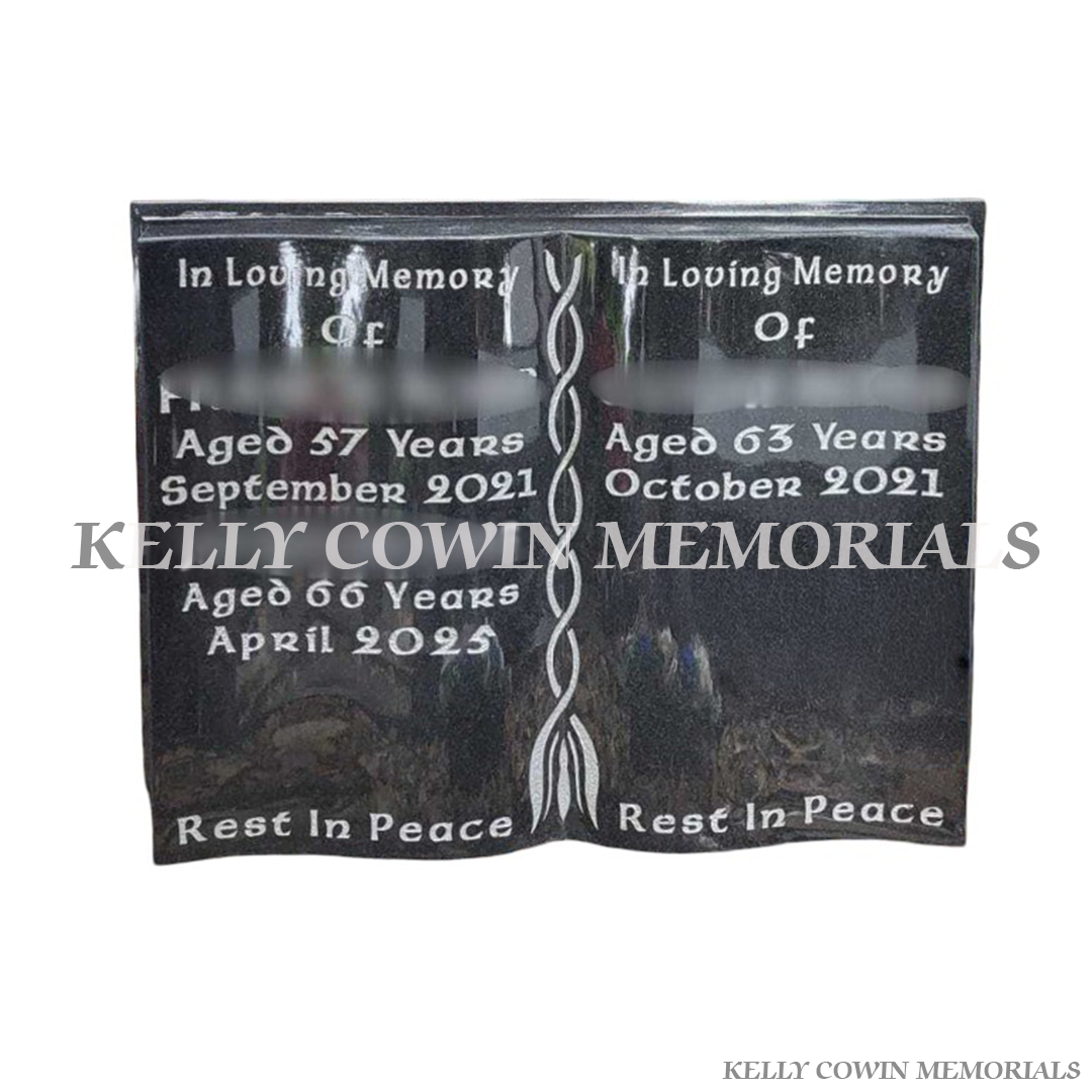 Black granite book with silver engraved lettering and polished finish