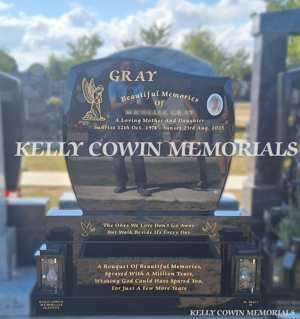 Black C1 granite headstone with gold inscription, ceramic memorial photo, flower box, two solar lanterns, sub base, base and plinth in Balgriffin Cemetery Dublin by Kelly Cowin Memorials.