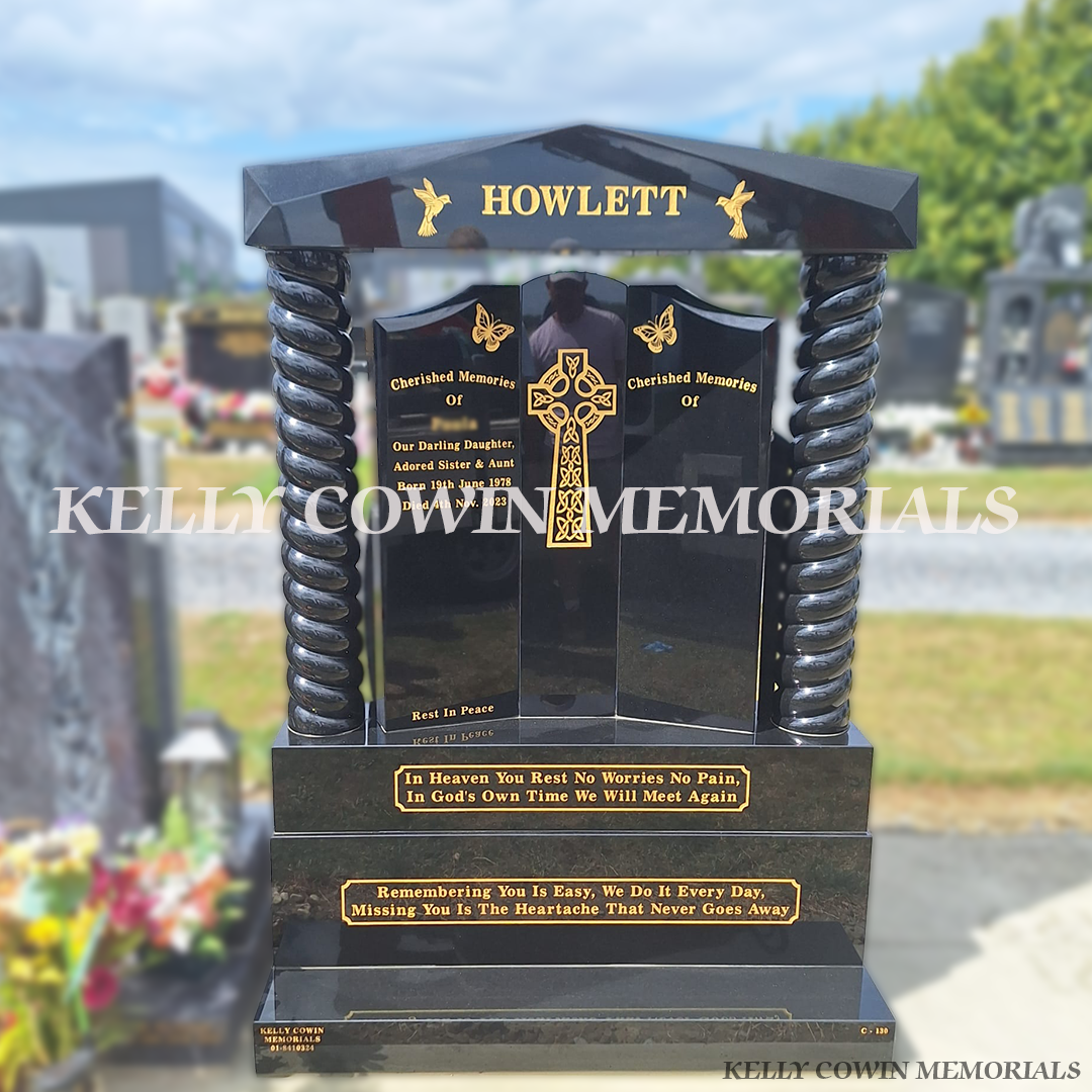 Black granite Gates of Heaven headstone with twisted pillars, sub base, base, plinth and 23.5ct gold leaf inscription installed in Dardistown Cemetery, Dublin by Kelly Cowin Memorials.