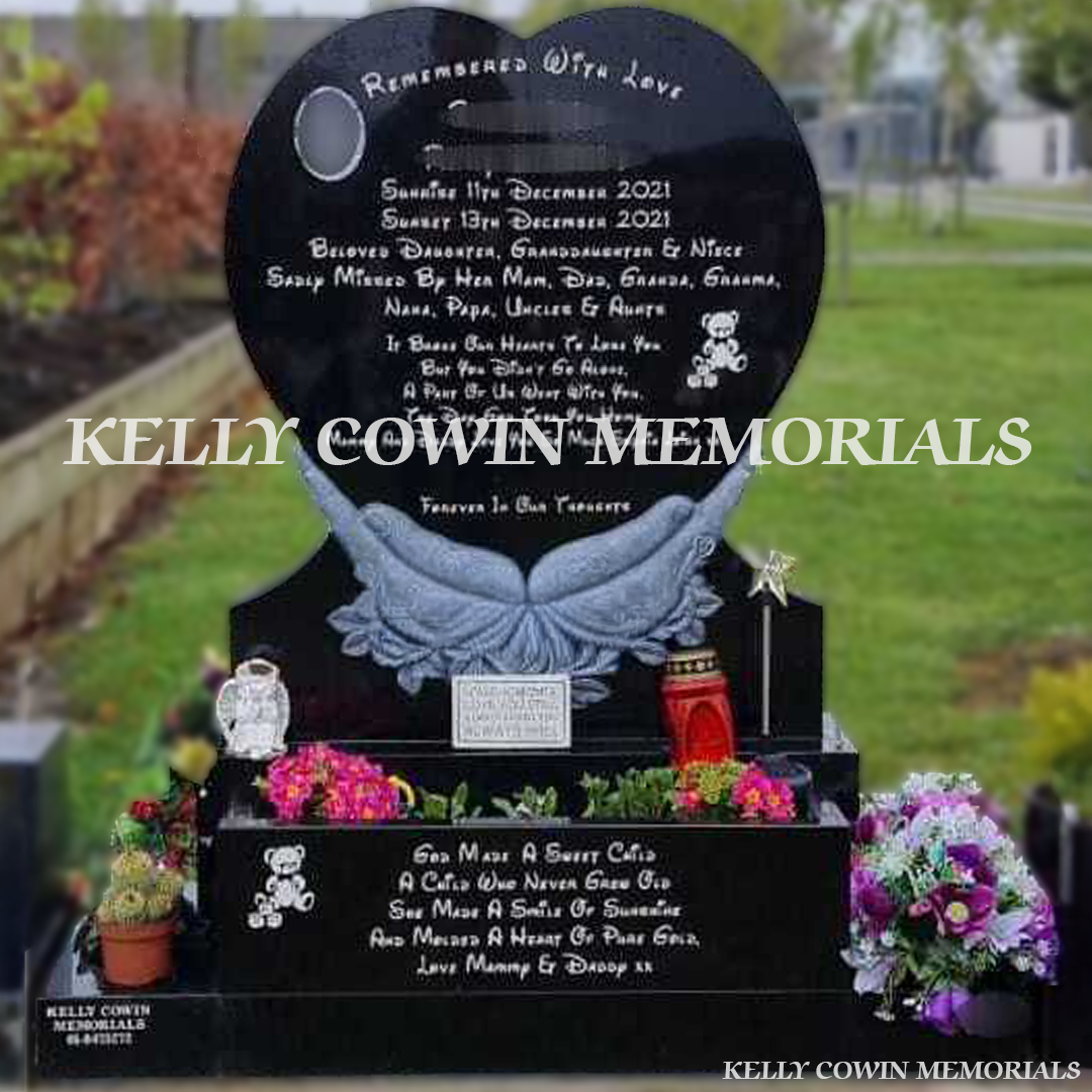 Front view of black granite Heart in Hands headstone with silver inscription and oval ceramic photograph in Dardistown Cemetery Dublin