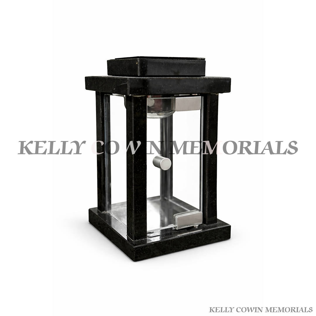 Black granite solar memorial lantern with glass panels for grave or headstone in Ireland
