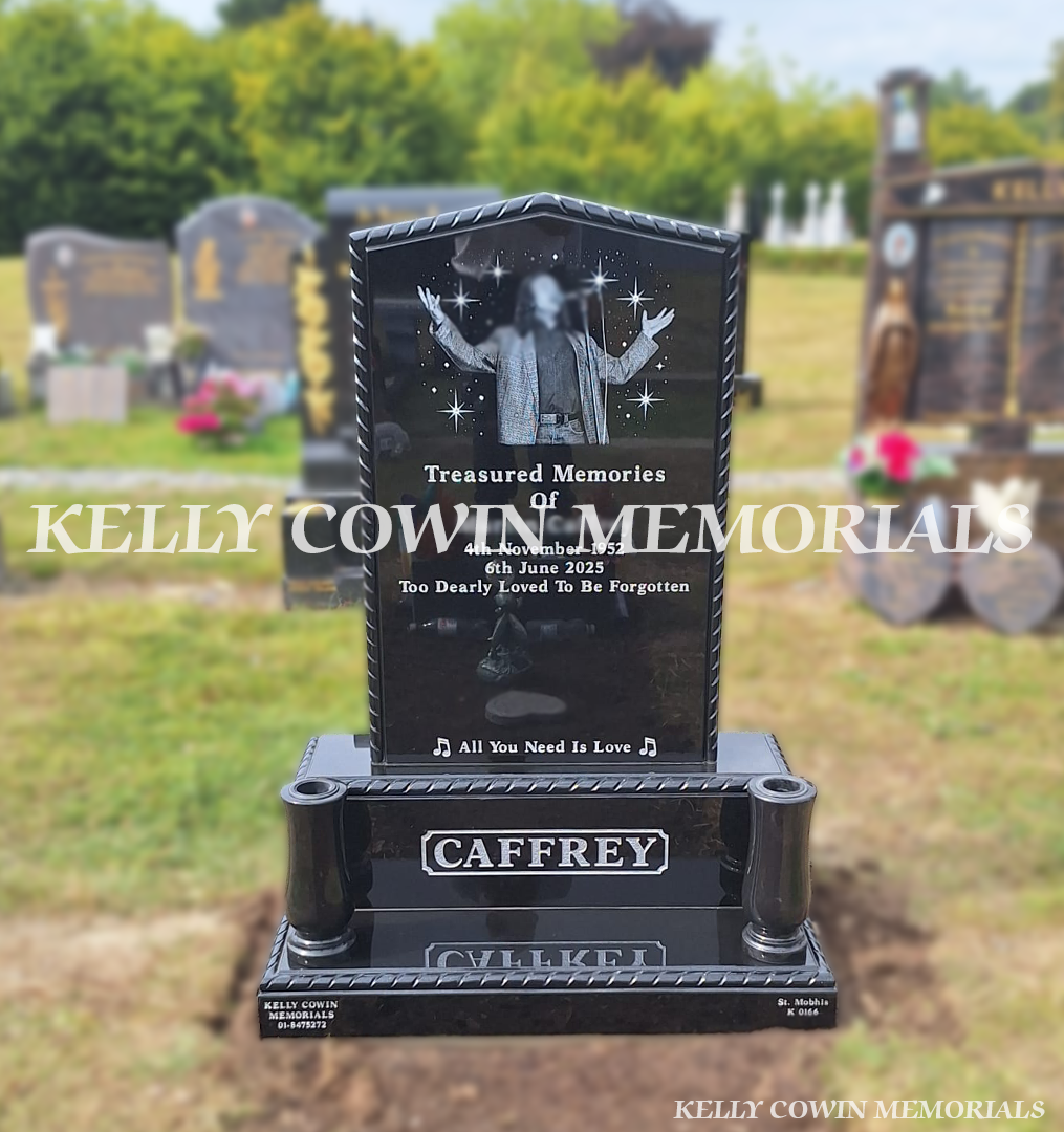 Black granite apex headstone with carved rope detail, large custom laser portrait, silver inscription and two vases erected in Glasnevin Cemetery Dublin.