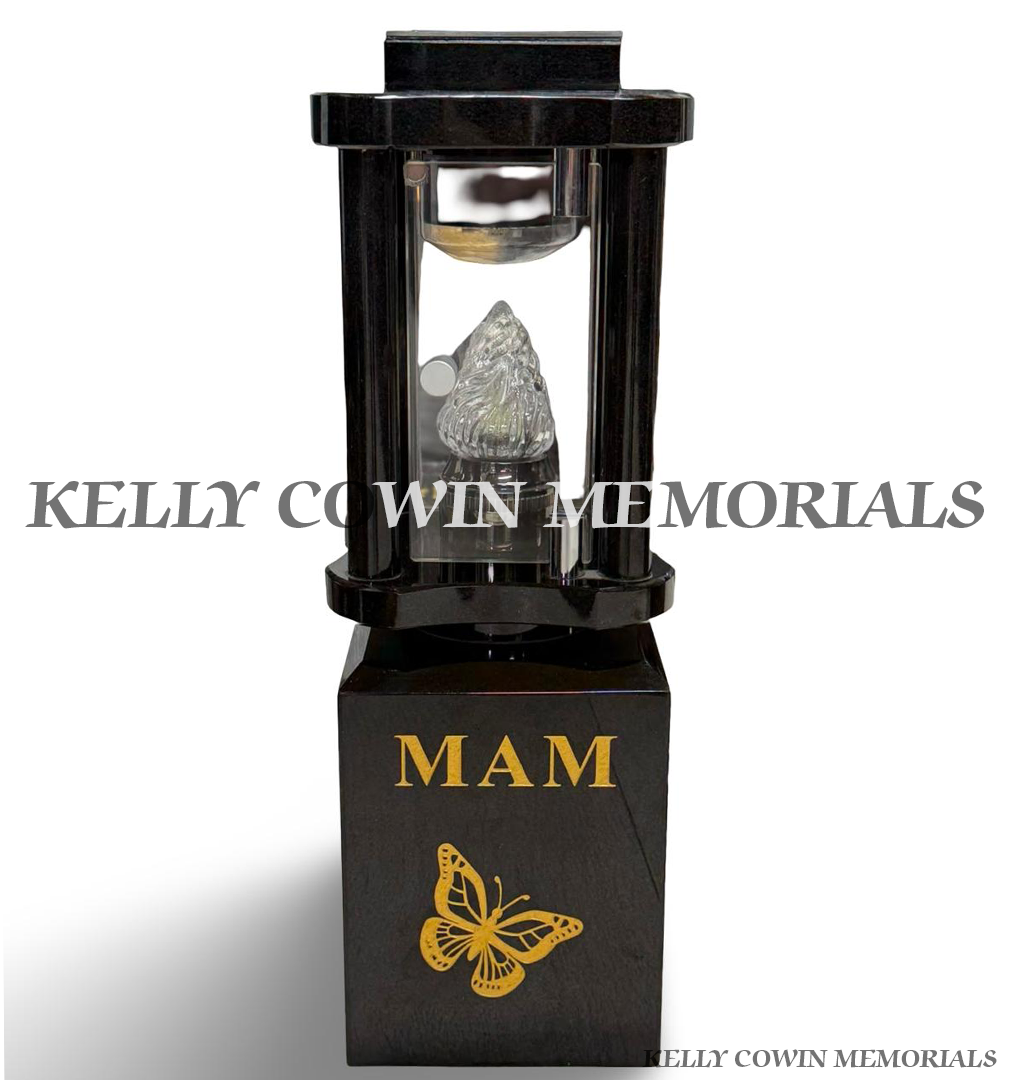 Black granite solar memorial lantern on personalised block with Mam gold inscription and engraved butterfly design.