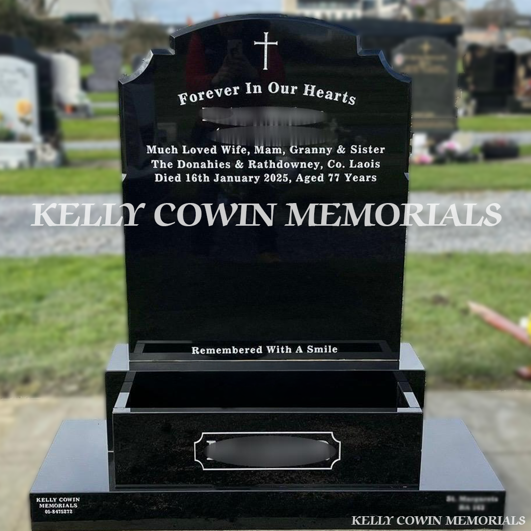 Front view of black granite Top Nine headstone with white inscription and flower box in Dardistown Cemetery Dublin
