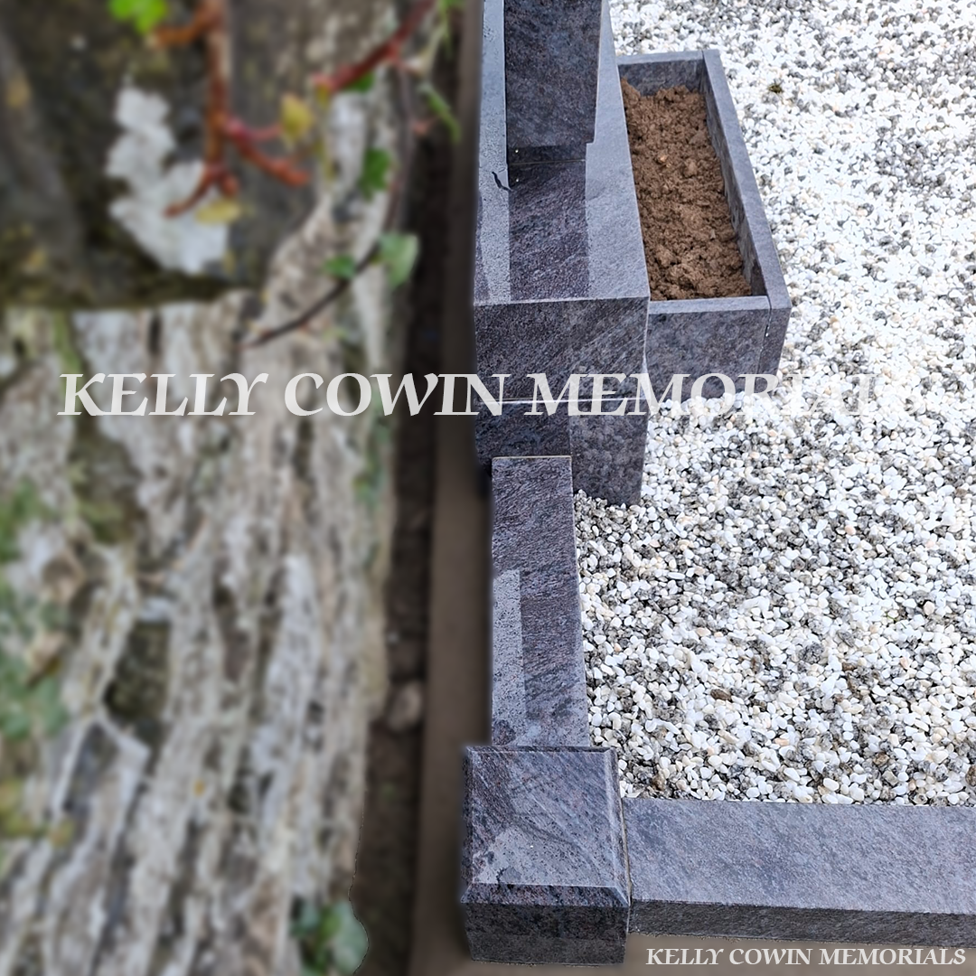 Close up side view two of Blue Lagoon memorial with kerbing and mixed chippings