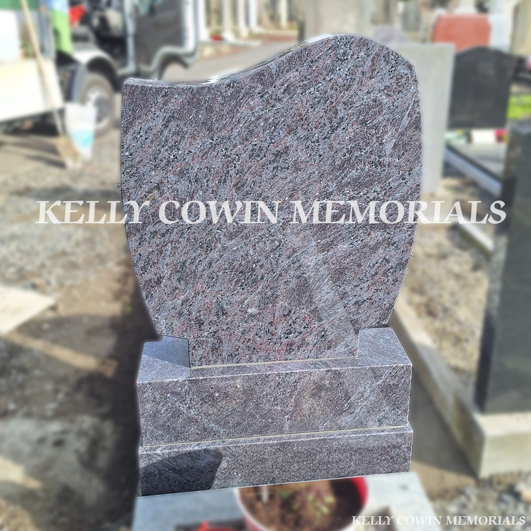 Front view of Blue Lagoon C1 headstone with gold inscription in Mount Jerome Cemetery