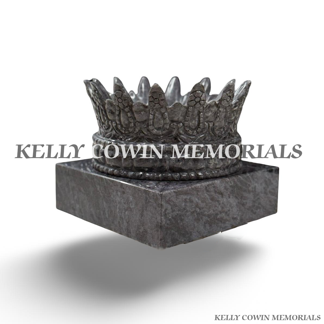 Blue Lagoon granite crown on plinth with custom silver memorial engraving.