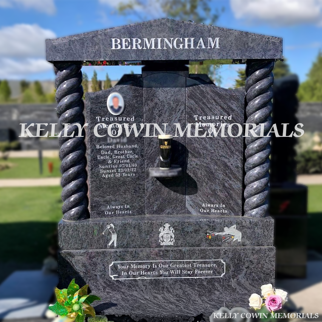 Front view of Blue Lagoon Gates of Heaven headstone with twisted pillars and cap erected in Dublin by Kelly Cowin Memorials