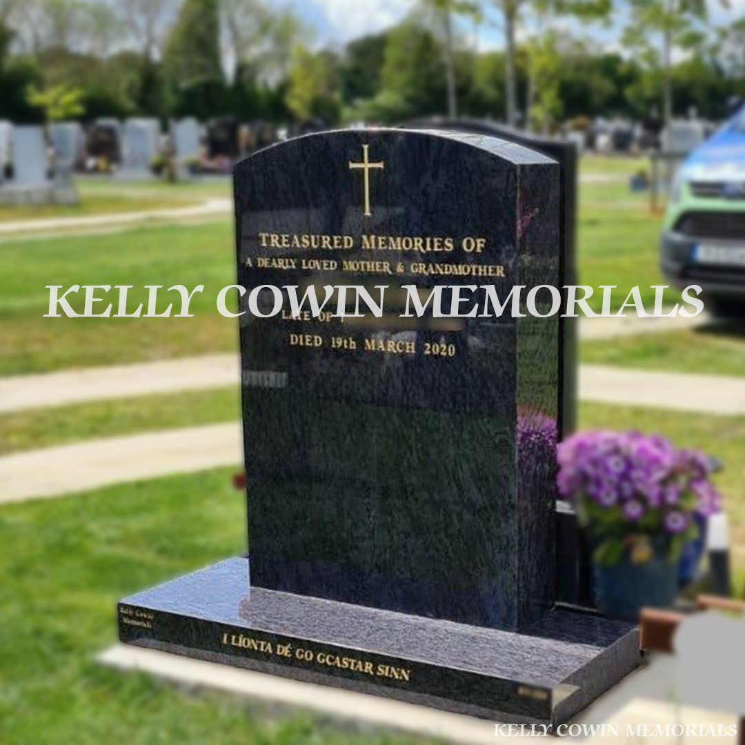 Front view of Blue Lagoon polished boulder headstone with gold inscription on plinth in Dardistown Cemetery Dublin
