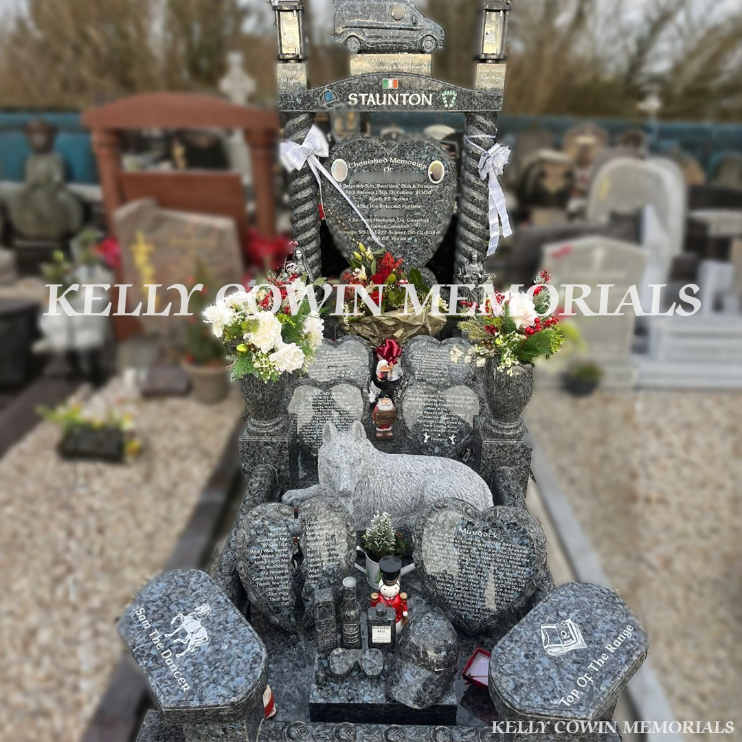 Front view of custom Blue Pearl heart headstone with twisted pillars and silver inscription in Fingal Cemetery Dublin