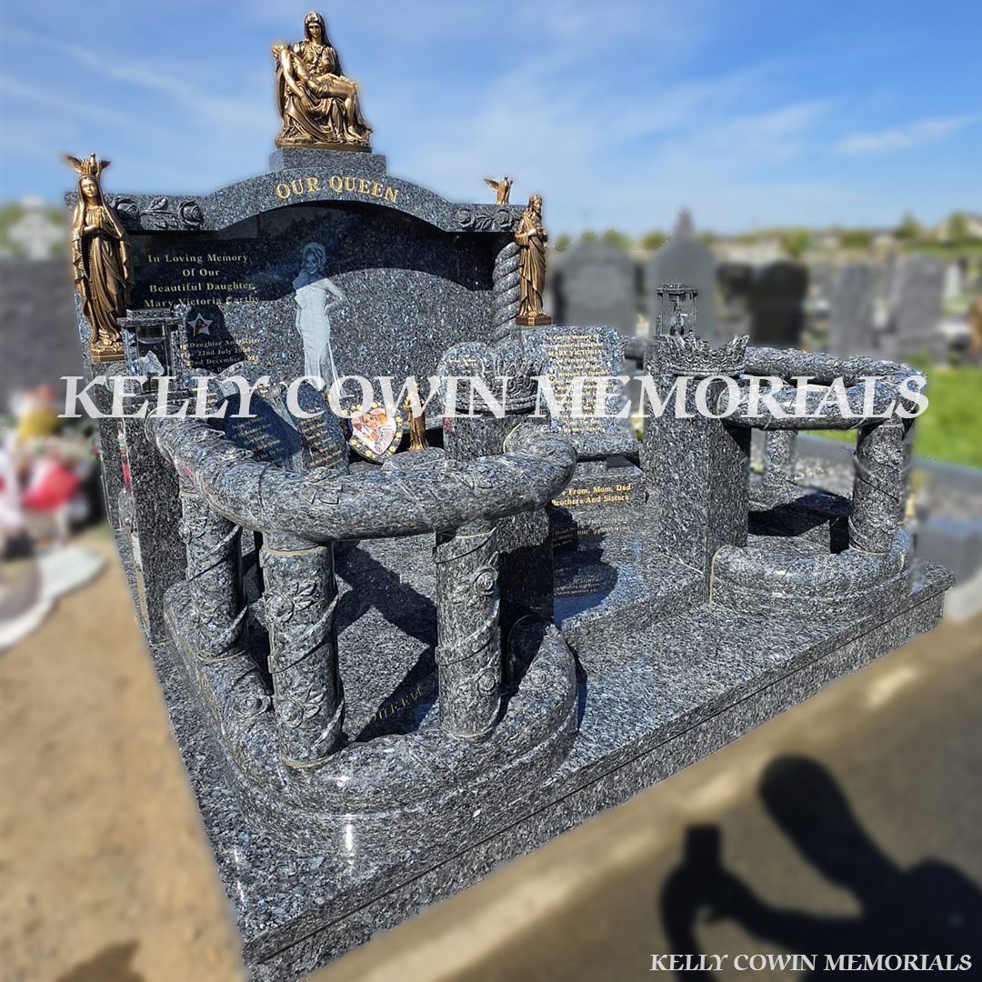 Side view of Blue Pearl memorial with railings, pillars and custom accessories