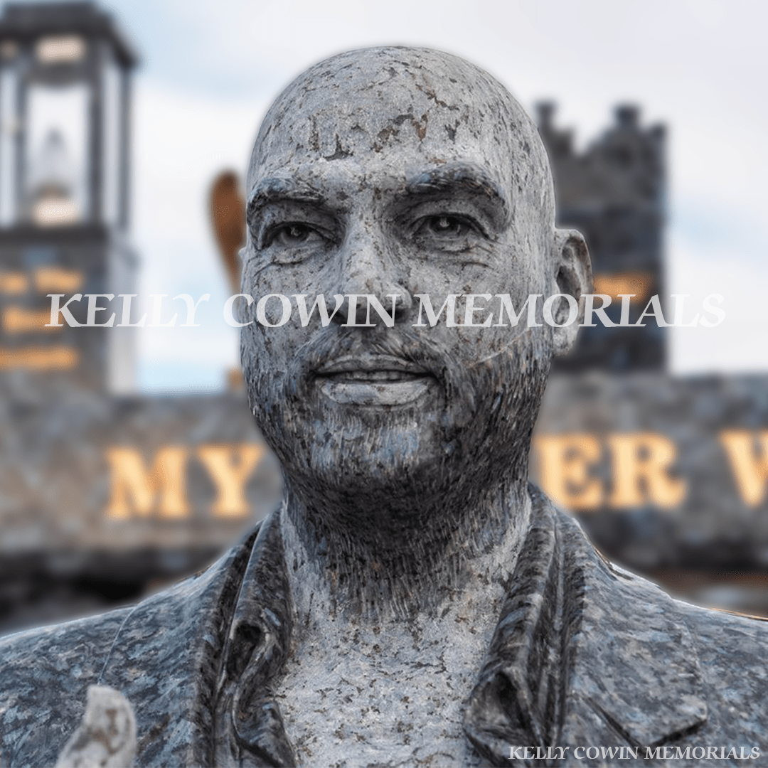 Blue Pearl Traveller custom headstone with life-size statue, twisted pillars and gates in Fingal Cemetery, North Dublin