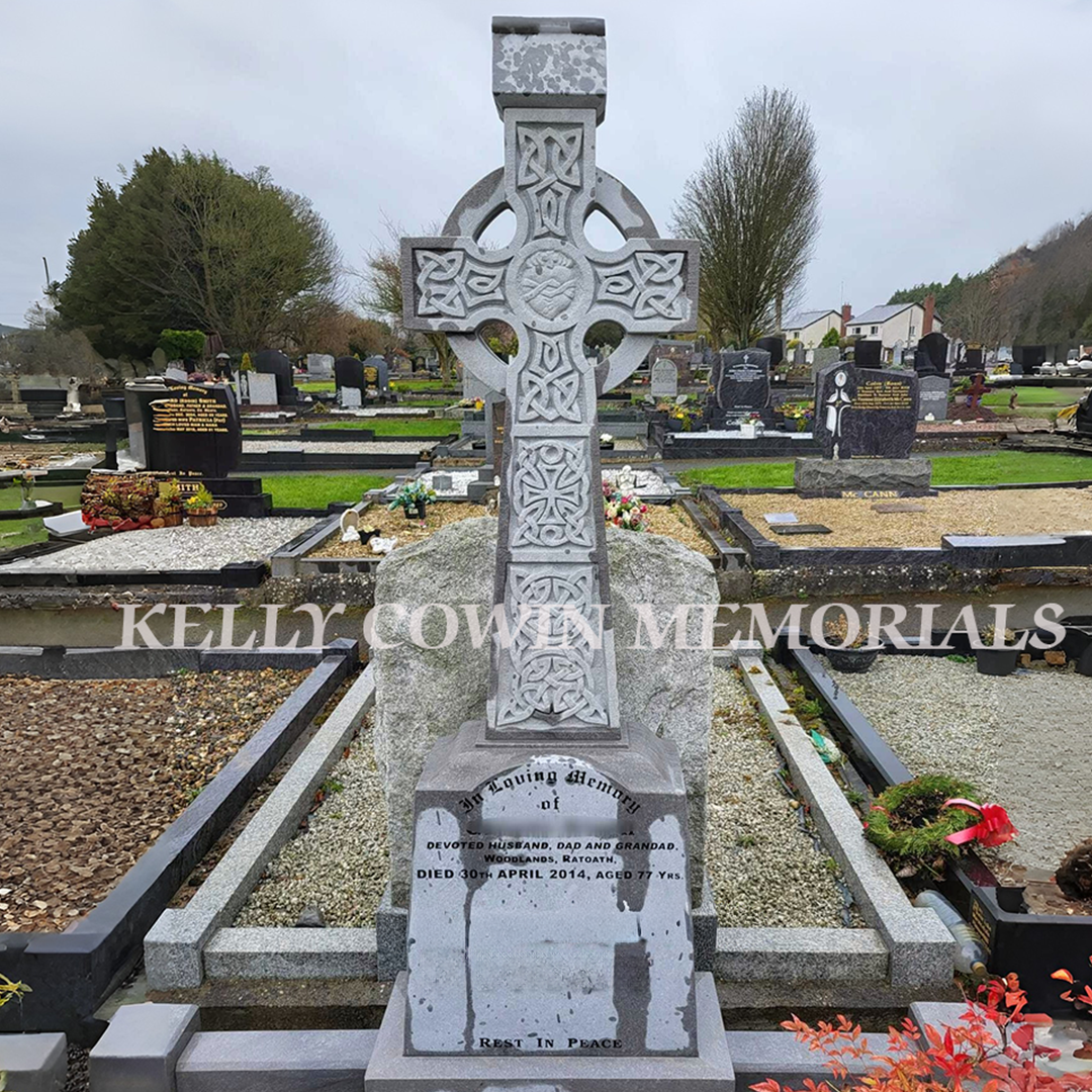 after celtic cross grave renovation with cleaned headstone and new stone chippings in Dublin Ireland