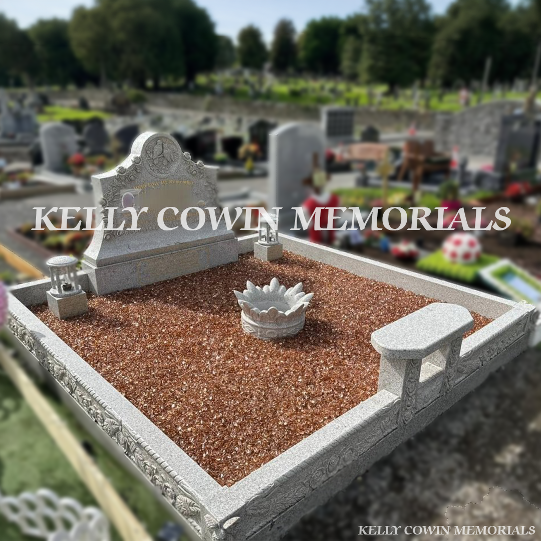 Front view of cream and gold granite custom headstone with gold inscription in a Dublin cemetery