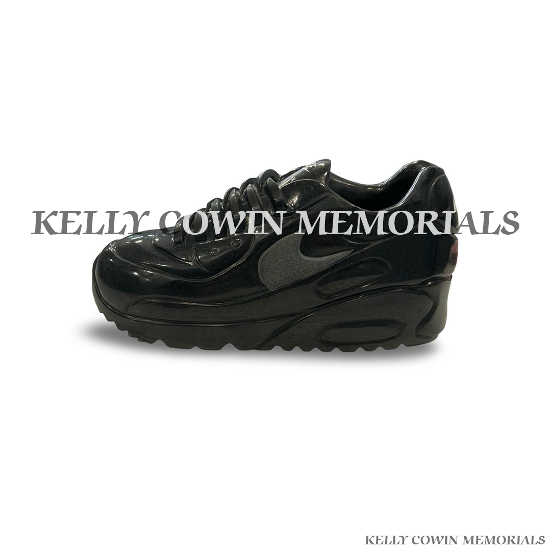 Side view of polished black granite trainer memorial accessory