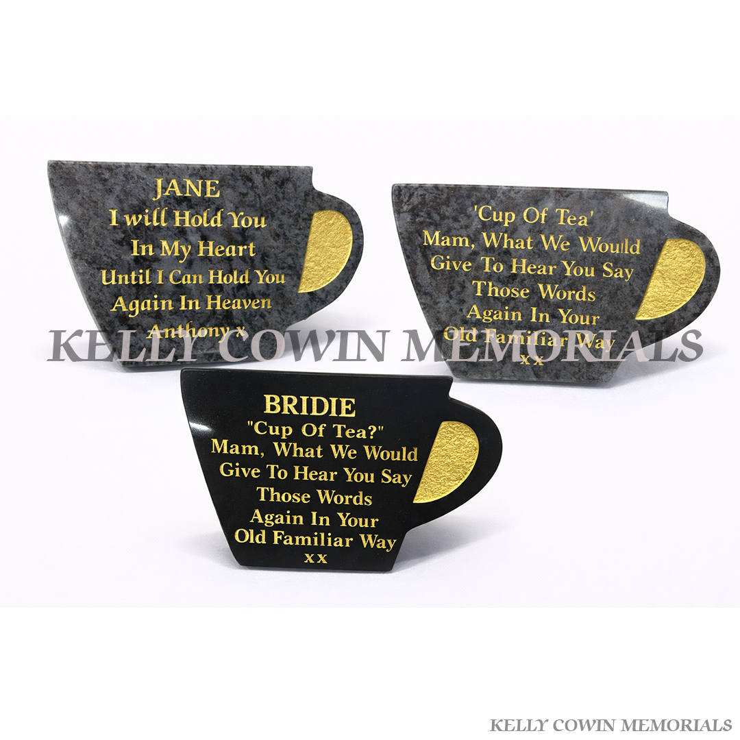 Personalised granite teacup shaped memorial plaque with engraved gold lettering, handcrafted in Ireland for graves and remembrance