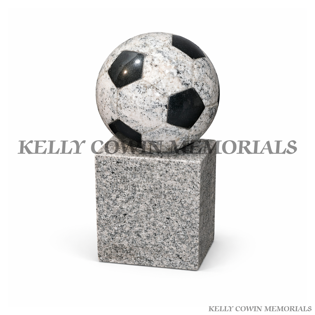 Football grave accessory on grey granite block with polished finish, handcrafted in Ireland, available locally and nationwide