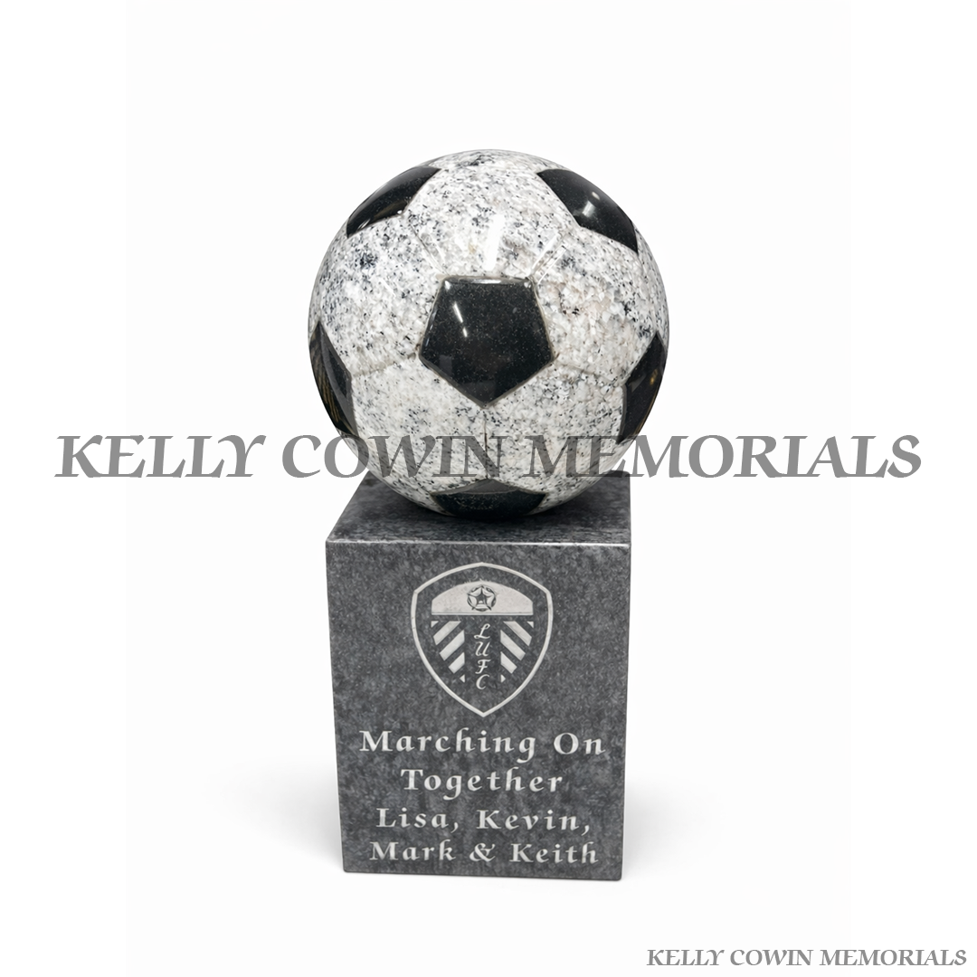 Football grave accessory on grey granite block with polished finish, handcrafted in Ireland, available locally and nationwide