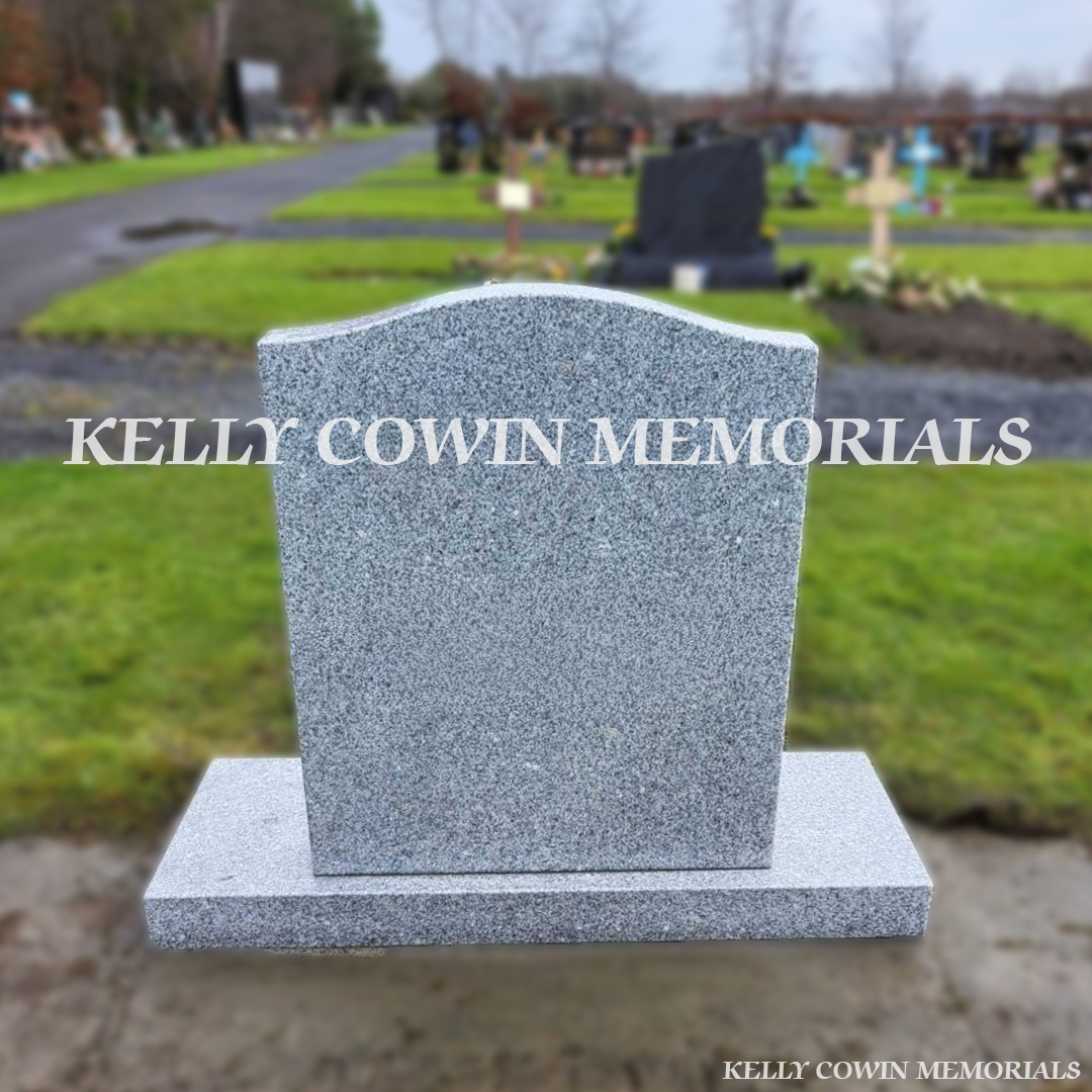 Back view of grey granite OG headstone installed by Kelly Cowin Memorials in Newlands Cross Cemetery