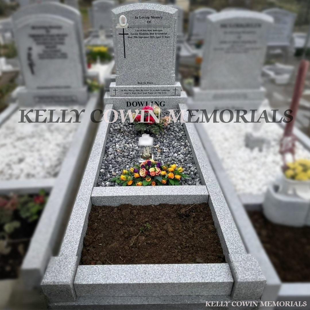 Grey granite polished boulder memorial with tassel detailing, polished chippings and garden kerbing by Kelly Cowin Memorials Ireland
