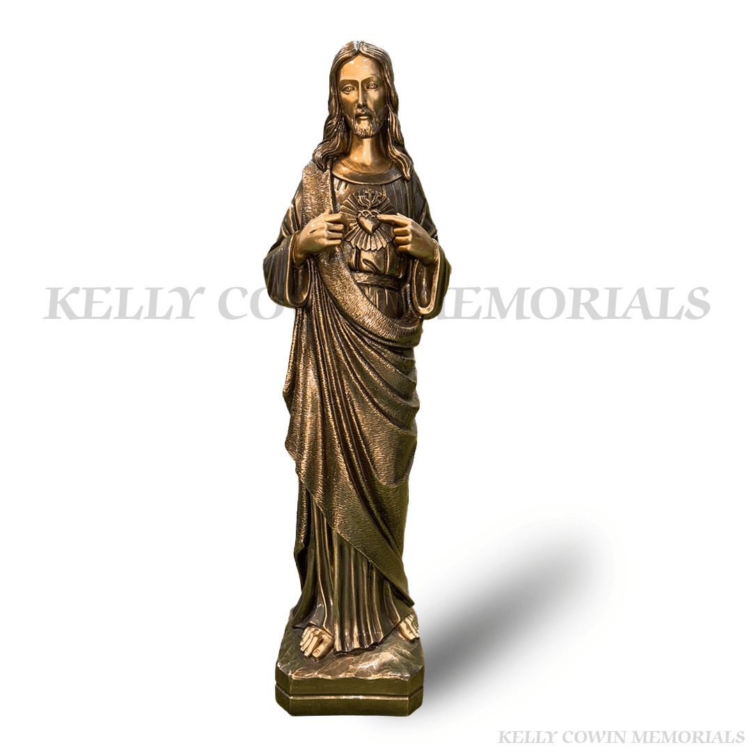 Bronze flat back Sacred Heart memorial statue mounted on headstone in Ireland