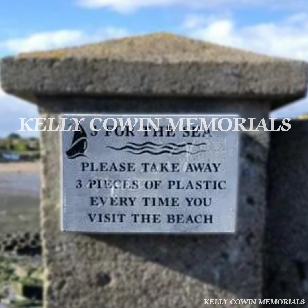 Front view of limestone memorial plaque with black engraved wording