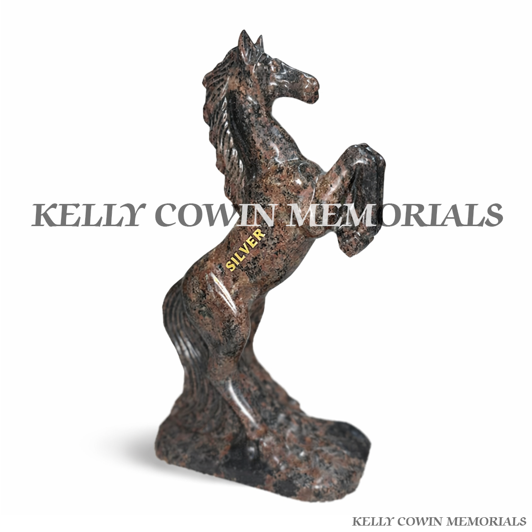 Close-up of gold engraved wording on Pandora granite horse statues