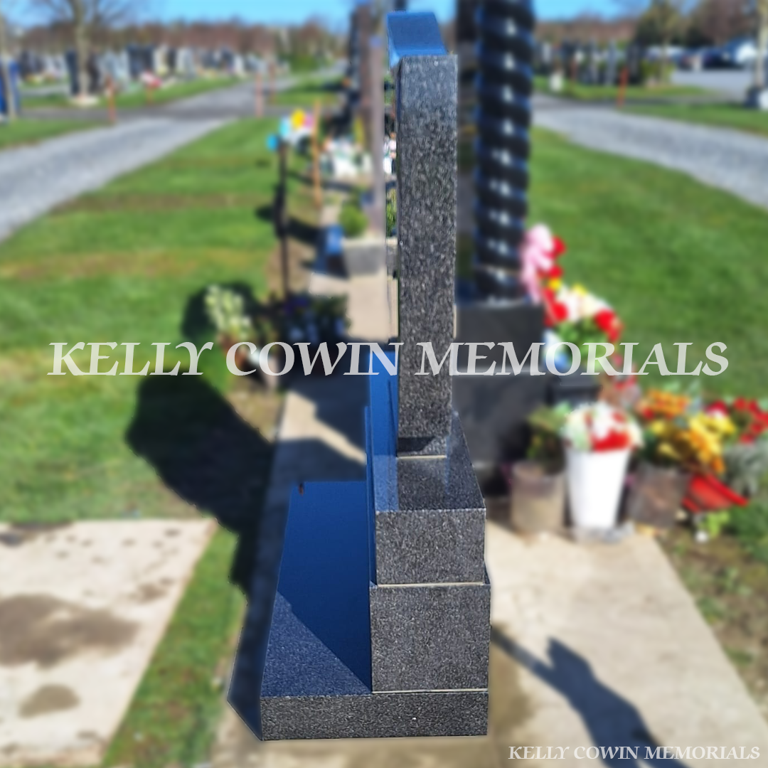 Side profile of Rustenburg Granite C1 headstone on sub-base, base and plinth in Dardistown Cemetery Ireland