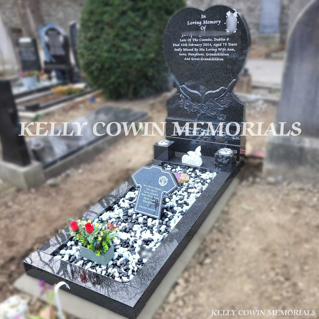 Front view of Rustenburg granite heart-shaped headstone with silver inscription in Mount Jerome Cemetery
