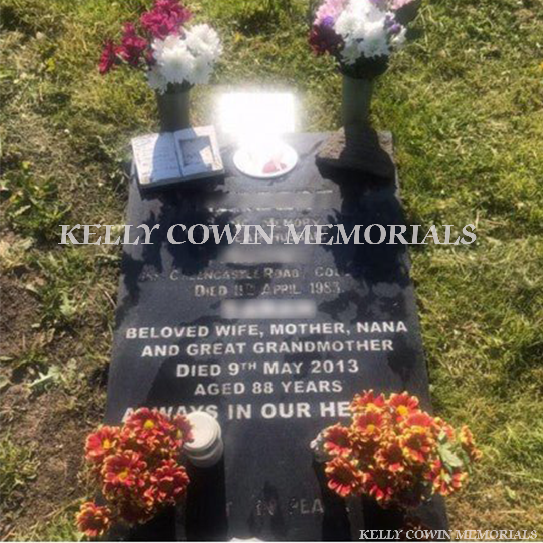 Before headstone plaque renovation in St Fintan’s Cemetery with cleaned lettering and fine bark grave finish