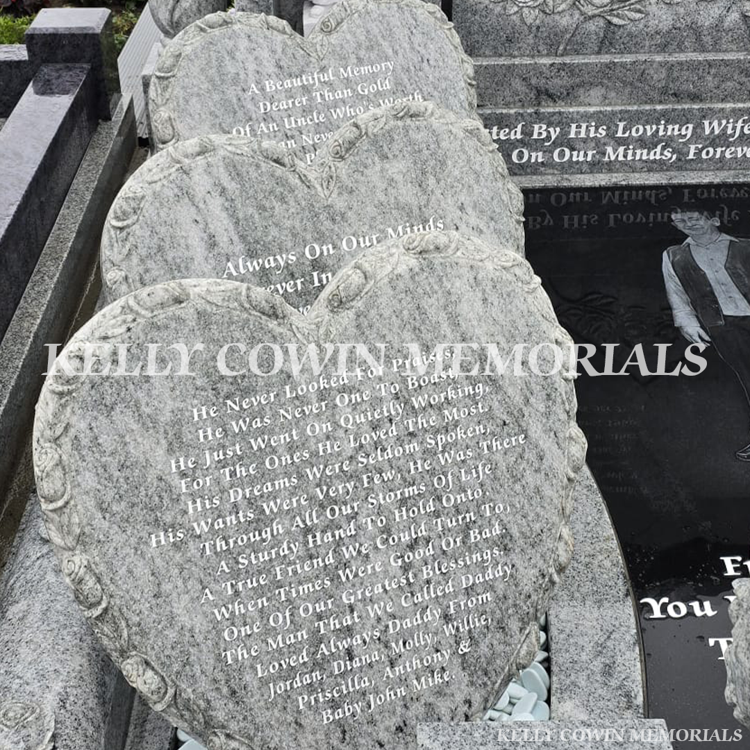 Detailed carved granite hearts with white engraved inscriptions on custom memorial in Creagh Cemetery Ballinasloe.