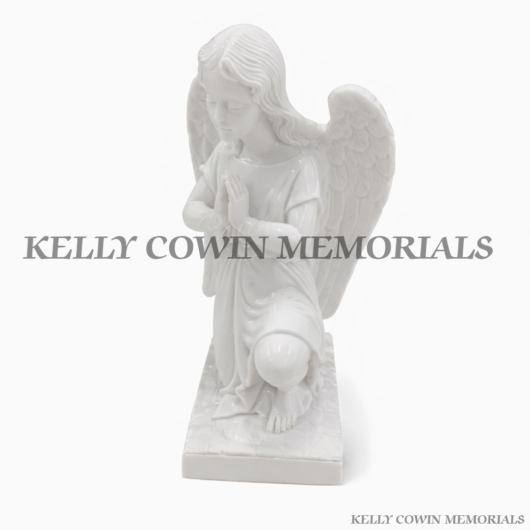 White kneeling angel memorial statue for grave decoration and cemetery ornament in Ireland