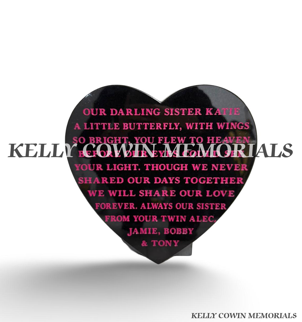 12 inch polished black granite heart memorial plaque with personalised pink engraved wording and freestanding support.