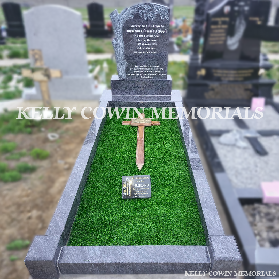 Front view of Blue Lagoon granite tree headstone with silver inscription in Bohernabreena Cemetery Dublin