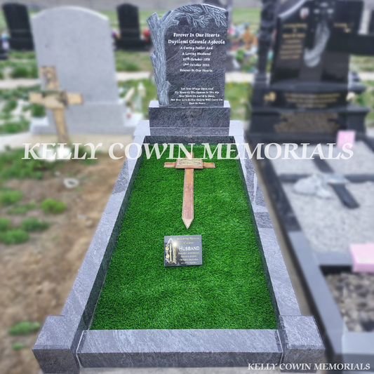 Front view of Blue Lagoon granite tree headstone with silver inscription in Bohernabreena Cemetery Dublin