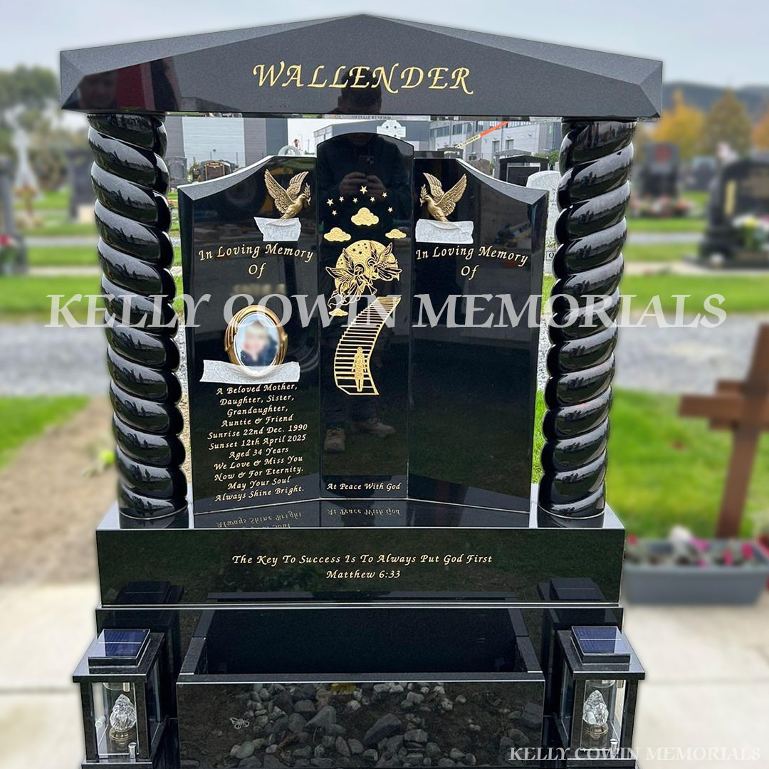 Black Granite Gates of Heaven headstone with twisted pillars, engraved image, gold leaf inscription, photo and solar lanterns installed in Dardistown Cemetery by Kelly Cowin Memorials