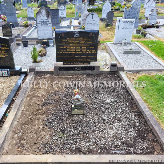 before grave renovation with limestone kerbing and decorative stone chippings in Dublin cemetery
