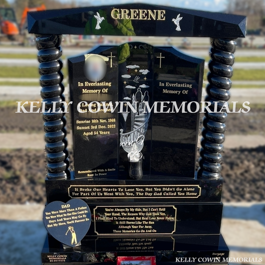 Front view of Black Granite Gates of Heaven headstone with twisted pillars and cap in Balgriffin Cemetery Dublin by Kelly Cowin Memorials