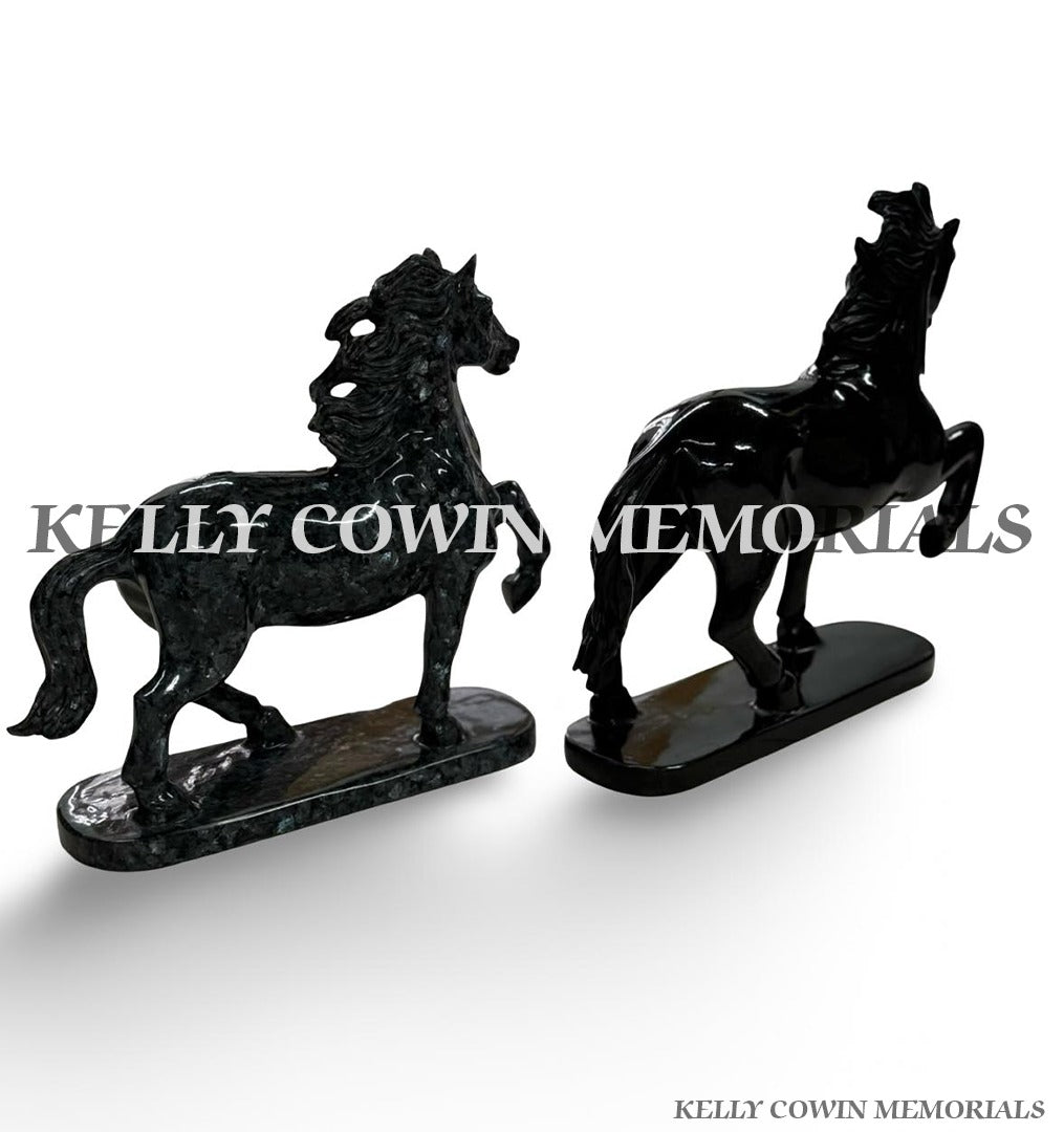 Blue Pearl granite horse memorial ornament with detailed carved mane, tail and raised front leg on polished granite base.