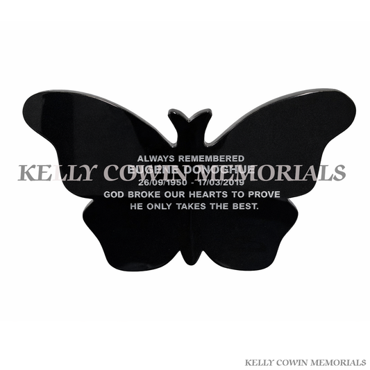 Polished black granite butterfly memorial plaque with engraved lettering by Kelly Cowin Memorials Ireland, available locally and nationwide.
