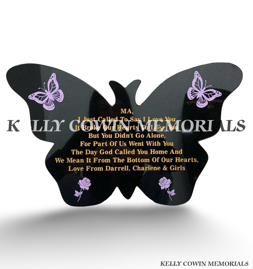 Personalised black granite butterfly memorial plaque with gold inscription, purple butterflies, roses and freestanding granite support by Kelly Cowin Memorials.