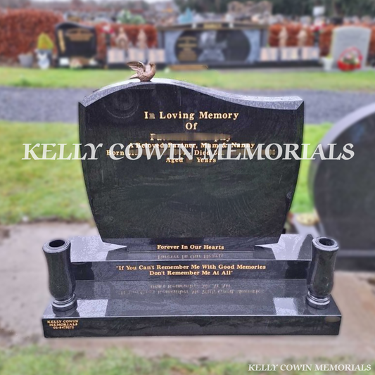 Front view of black granite C1 headstone with gold inscription and bronze dove in Newlands Cross Cemetery