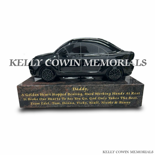 Front view of black granite Toyota Avensis memorial accessory on Pandora plinth