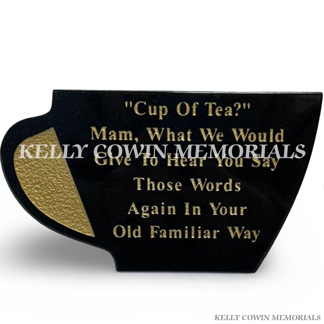 Black granite cup of tea shaped memorial plaque with gold lettering