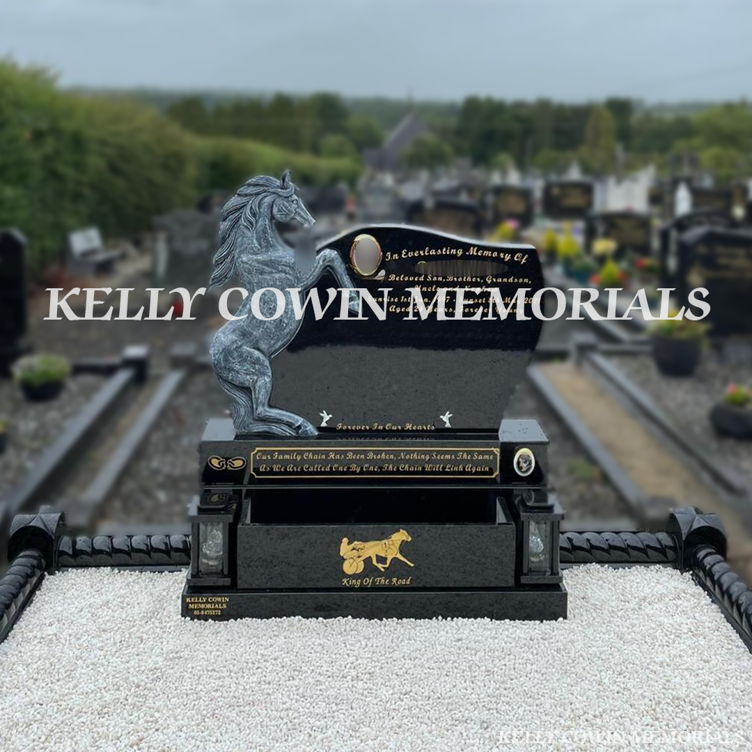 Front view of custom black granite antique carved horse headstone with gold inscription in Dublin Cemetery