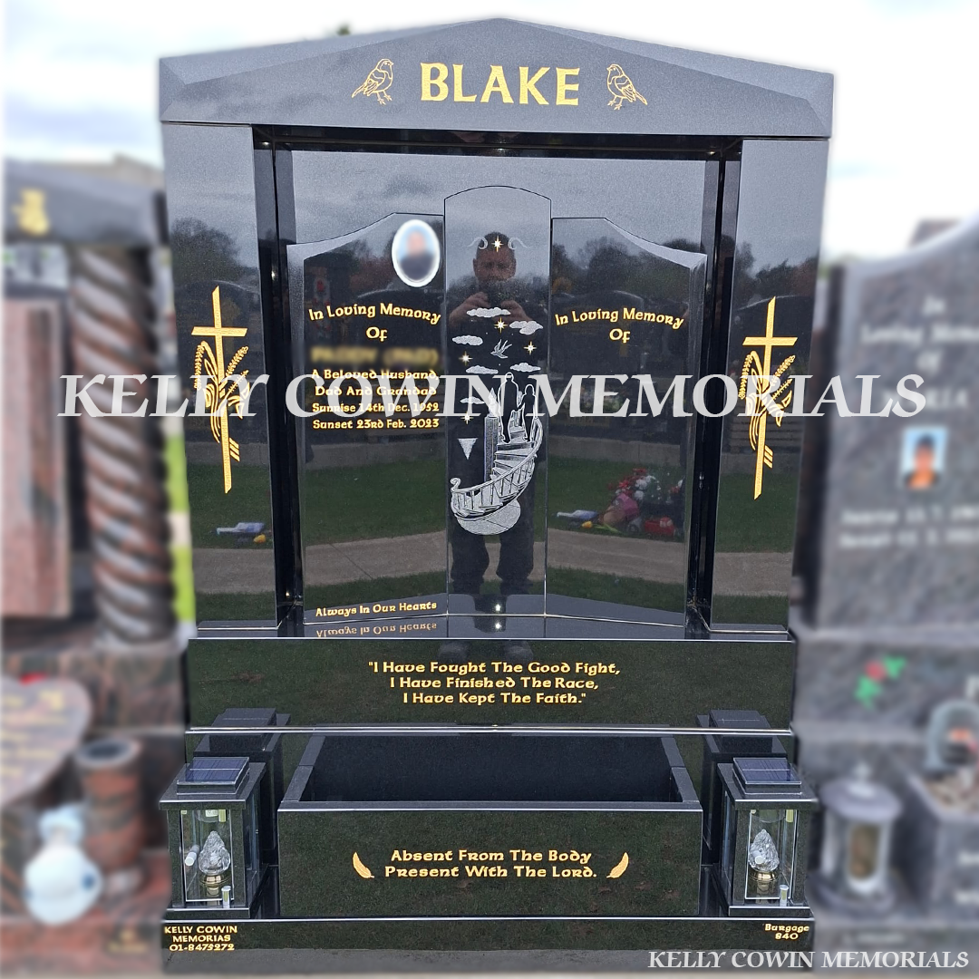 Front view of black granite Gates of Heaven headstone with gold inscription in Balgriffin Cemetery