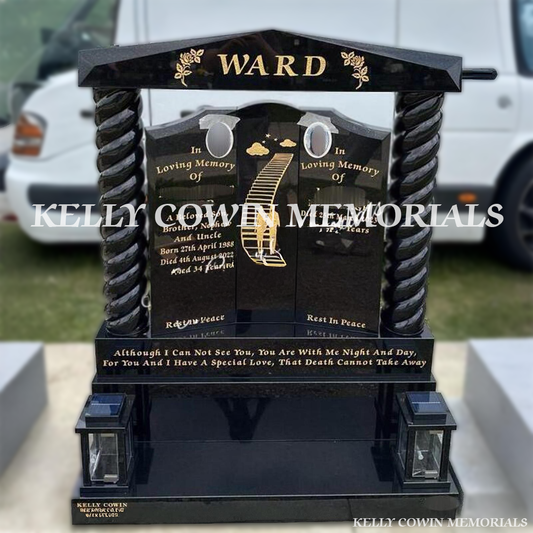 Front view of Black Granite Gates of Heaven headstone with cap and twisted pillars on base and plinth in Balgriffin Cemetery Dublin
