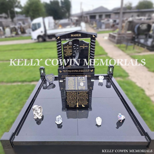 Front view of black granite Gates of Heaven headstone with gold leaf inscription in Fingal Cemetery
